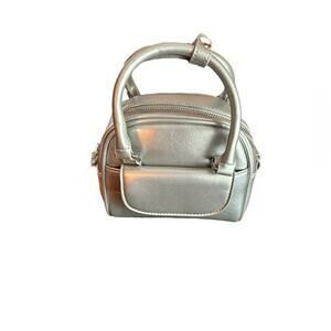 No Rest for Bridget Silver "Bowling" Clutch with Convertible Shoulder Strap